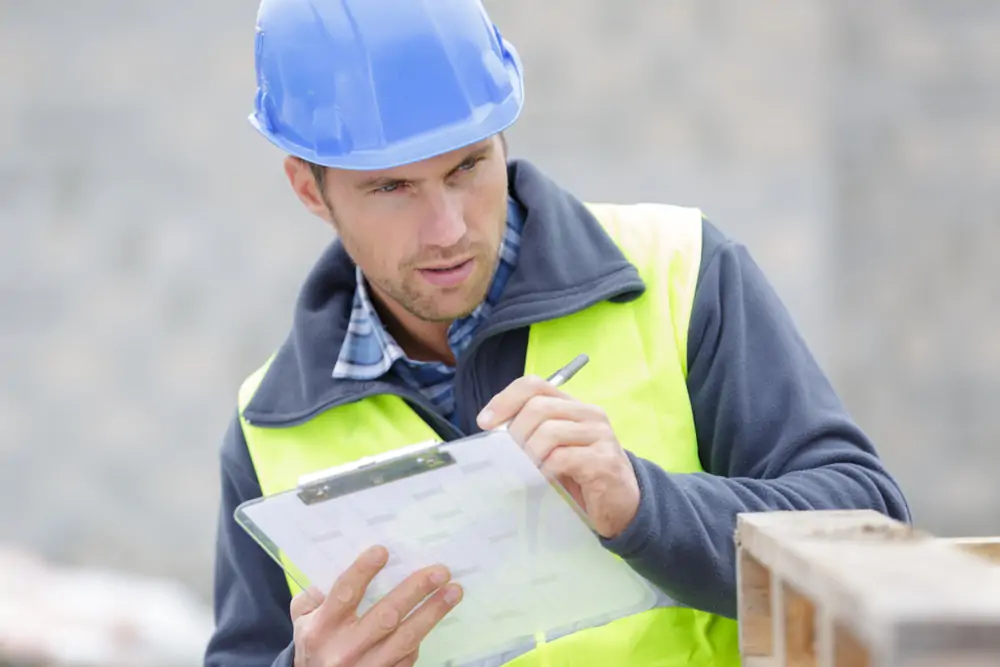 construction manager writing